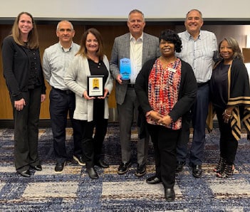 The WaterStone Bank team accepting these honors on behalf of the company are.